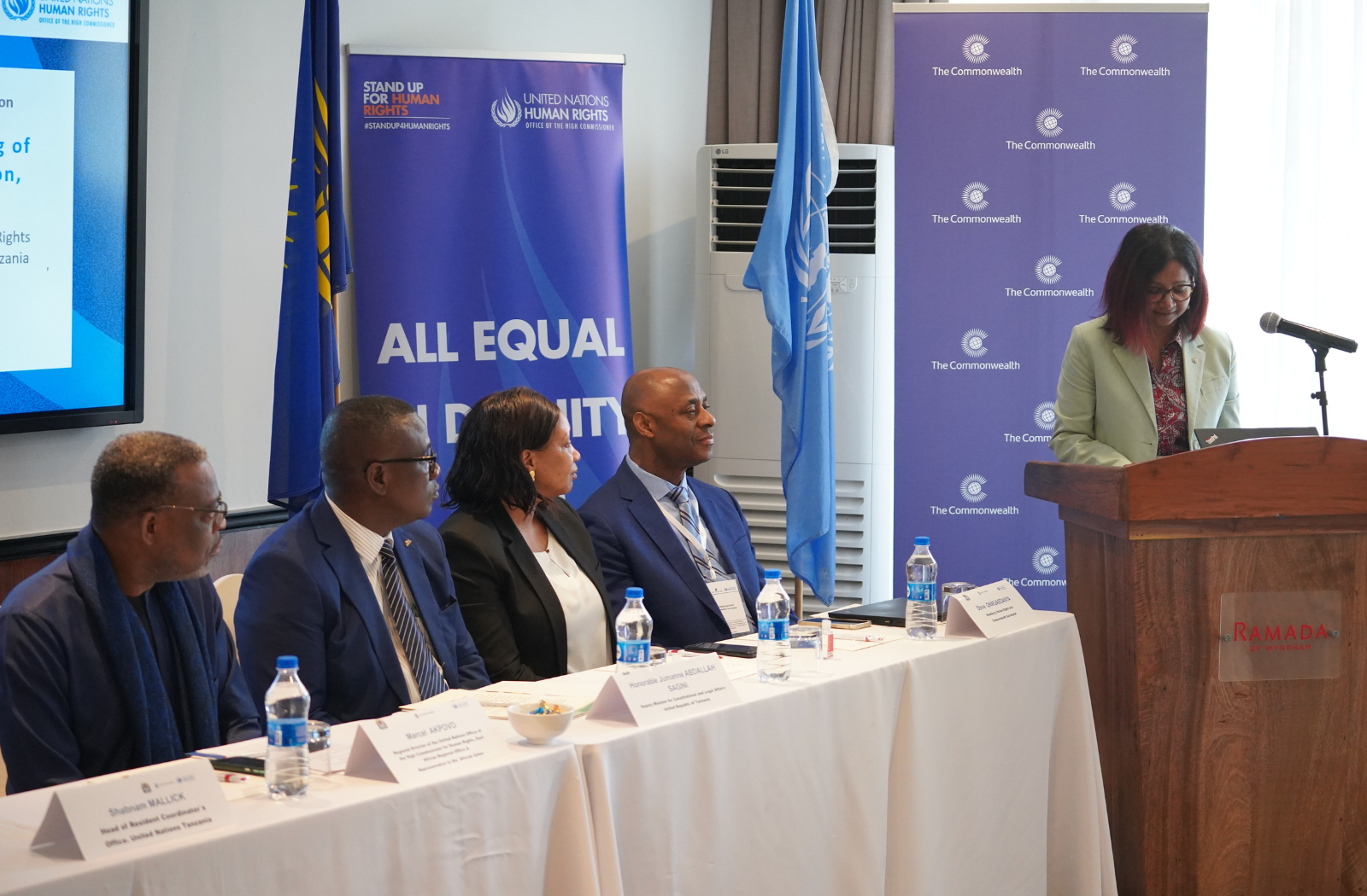 Conference with speaker at podium