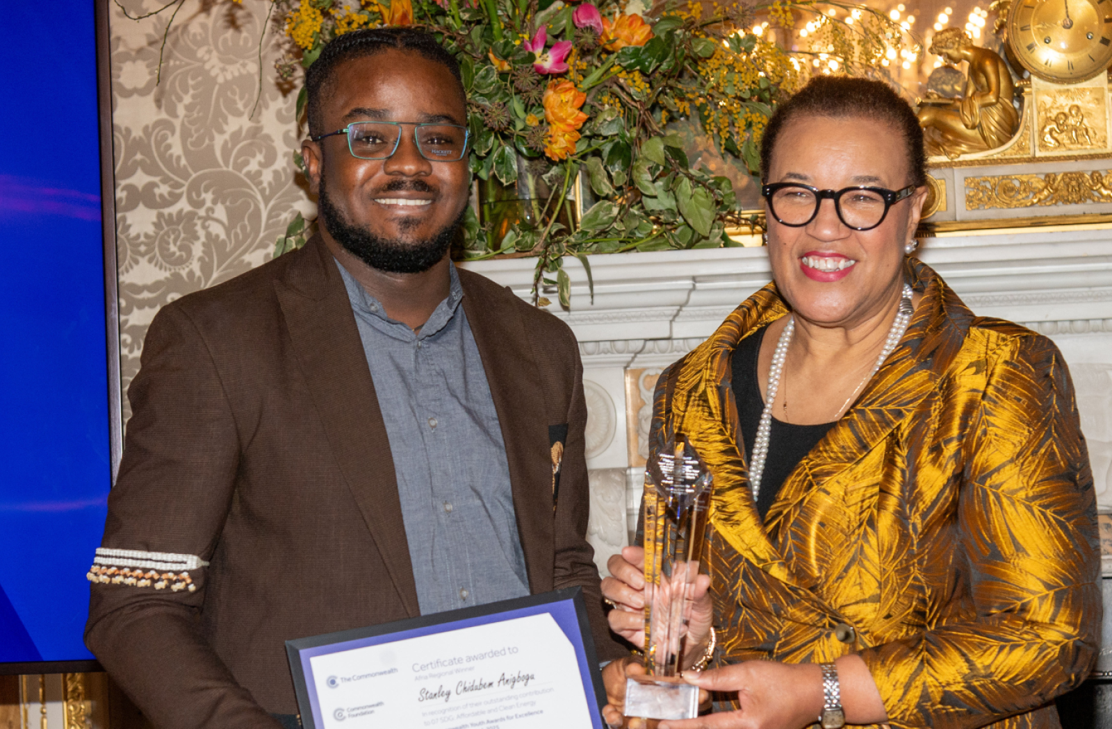 Commonwealth Secretary-General, the Rt Hon Patricia Scotland KC and Stanley youth prize winner posing for a picture